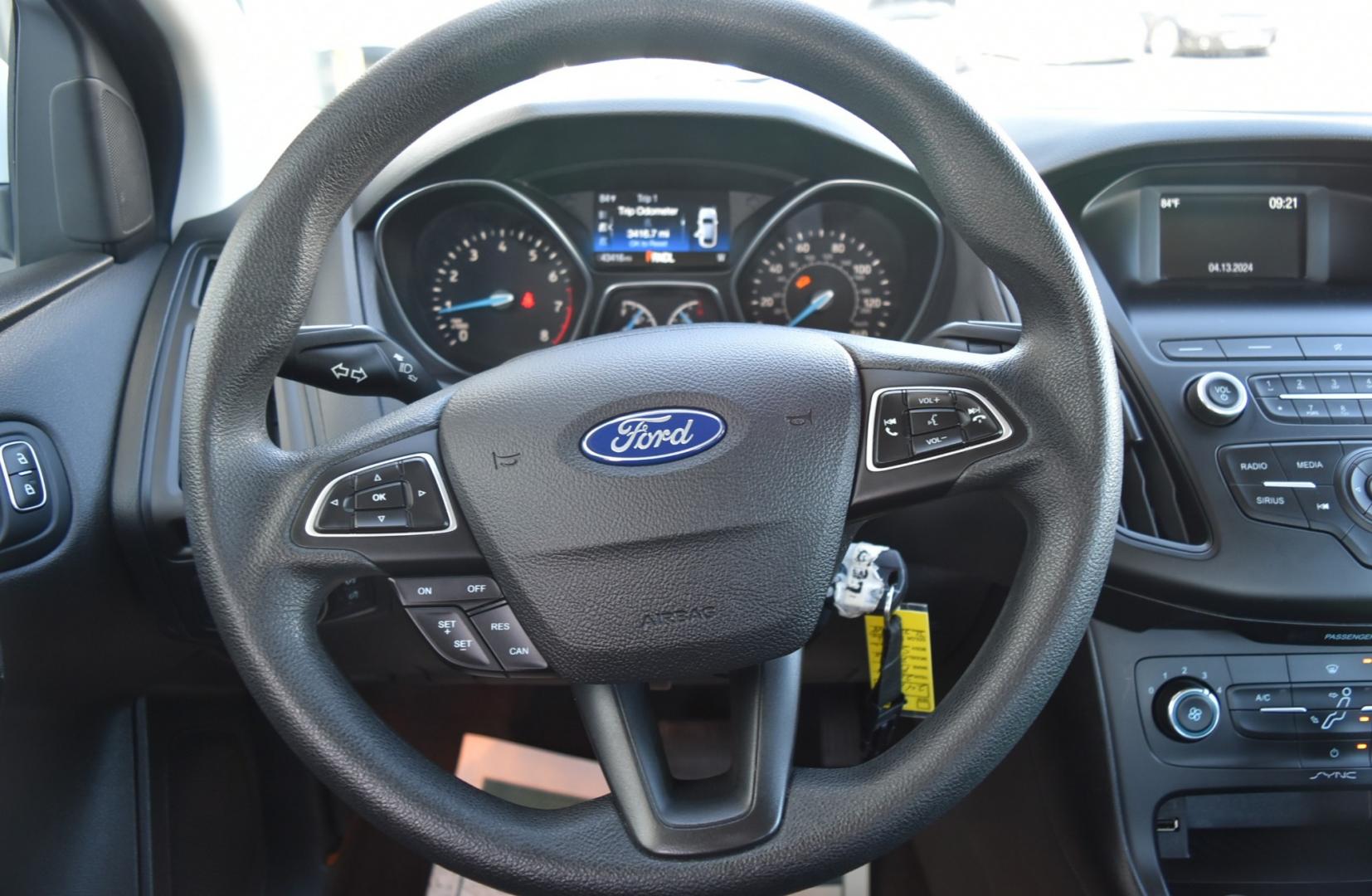 2018 White /Black Ford Focus SE (1FADP3F22JL) with an 2.0L I-4 GDI TI-VCT engine, 6-Speed Powershift Automatic transmission, located at 1600 E Hwy 44, Rapid City, SD, 57703, (605) 716-7878, 44.070232, -103.171410 - Photo#13